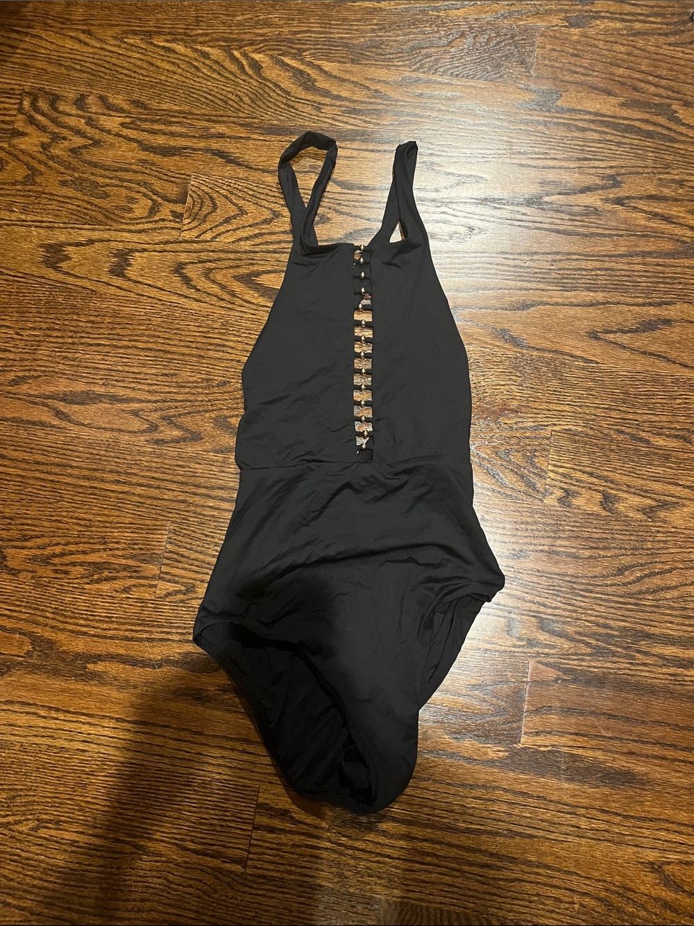 Sexy black one piece with gold bead detail